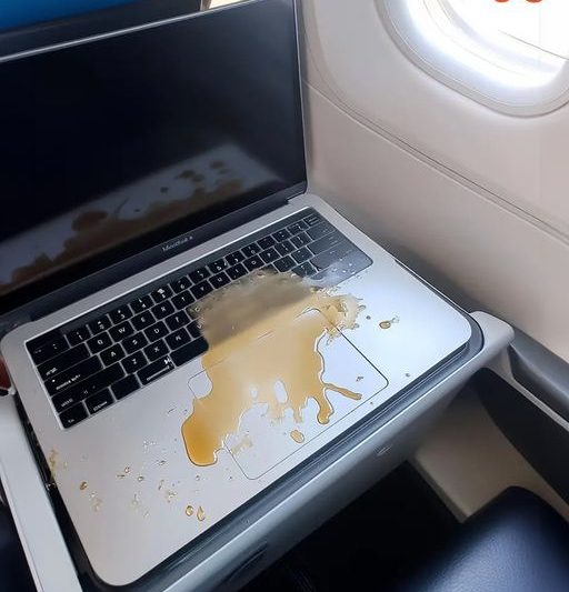 Entitled Passenger Spilled His Drink on My Laptop, Completely Ruining It – Karma Caught Up With Him as Soon as We Landed